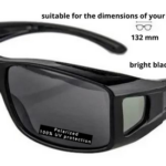 Polarisoiva omien lasien päälle laitettavat aurinkolasit / leveys 140mm, korkeus 38mm.
