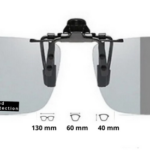 Polaroid päikesekaitseklipp tumenevad prillide peale kinnitamiseks / klipsi laius 130mm, läätse laius 60mm, kõrgus 40mm.