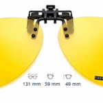 Päikesekaitseklipp prillide peale kinnitamiseks. Kollane 30%   / klipsi laius 131mm, läätse laius 59mm, kõrgus 49mm